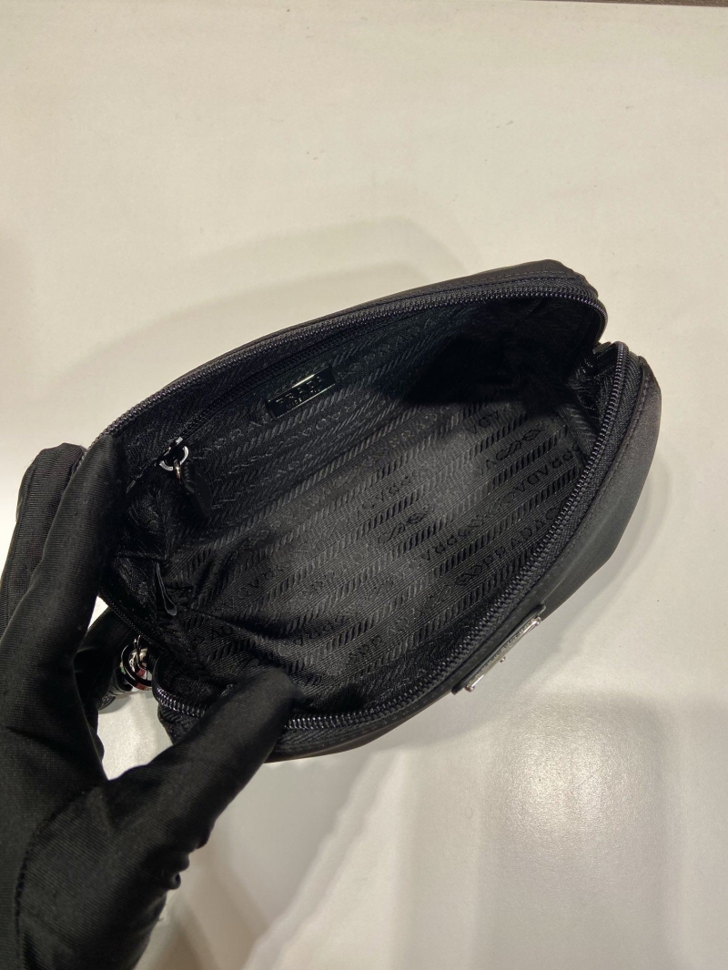 Pra*a clutch bags